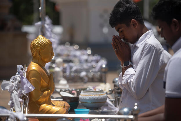 Praying at Ruwanweli Maha Seya, Anuradhapura, Sri Lanka