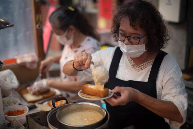 Tainan, Taiwan: Market in Anping Old Street - Preparing Coffin Bread, invented here - Thick slice of toast that is fried, hollowed, filled with chicken, shrimp, veggies and bechamel sauce