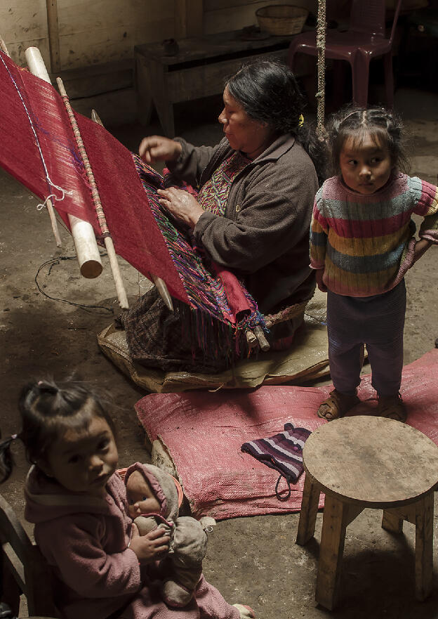 Grandma weaving in her house in Cocop near Nebaj