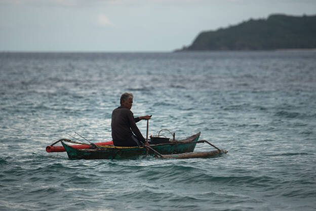 In daytime, he aims to catch fish
