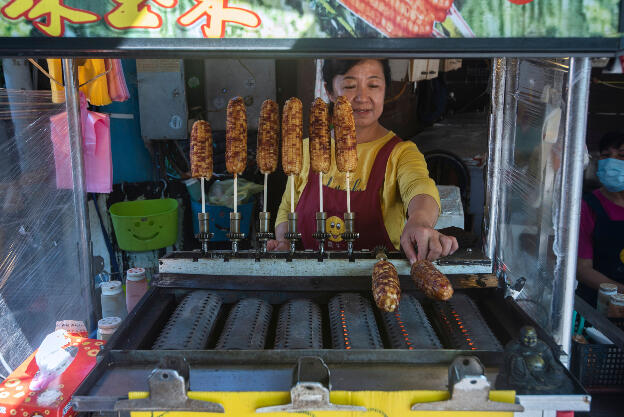 Selling fried corn in Daxi Old Street, Taiwan