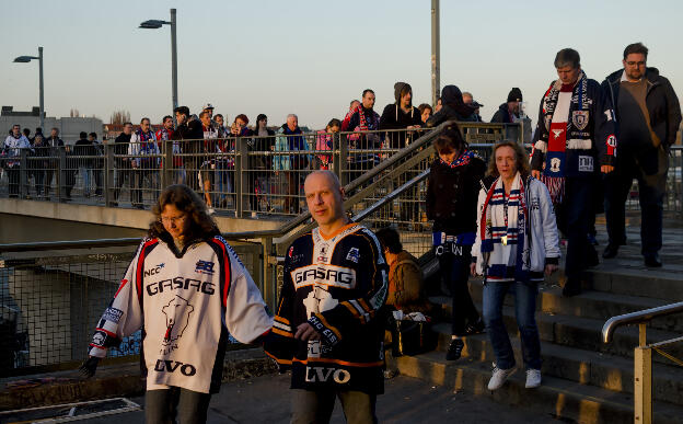 Fans of Eisbären Berlin ice hockey team don't look happy