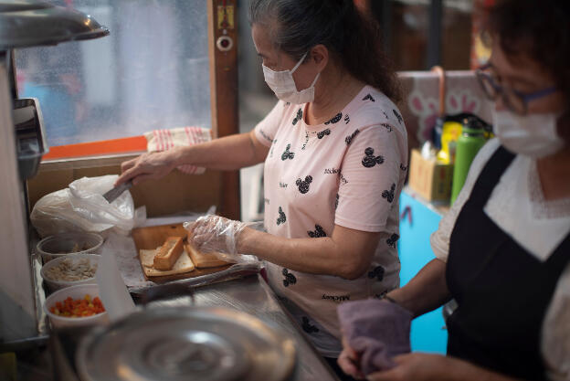 Tainan, Taiwan: Market in Anping Old Street - Preparing Coffin Bread, invented here - Thick slice of toast that is fried, hollowed, filled with chicken, shrimp, veggies and bechamel sauce