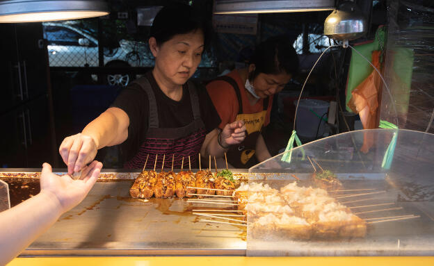 Selling stinky tofu in Daxi Old Street, Taiwan